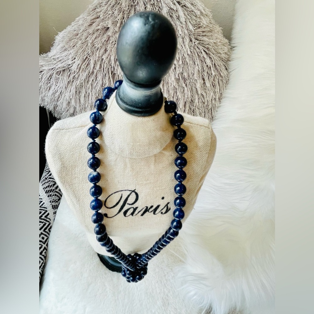 Blue Glass Beaded Necklace Individually Knotted. 32 inches long.